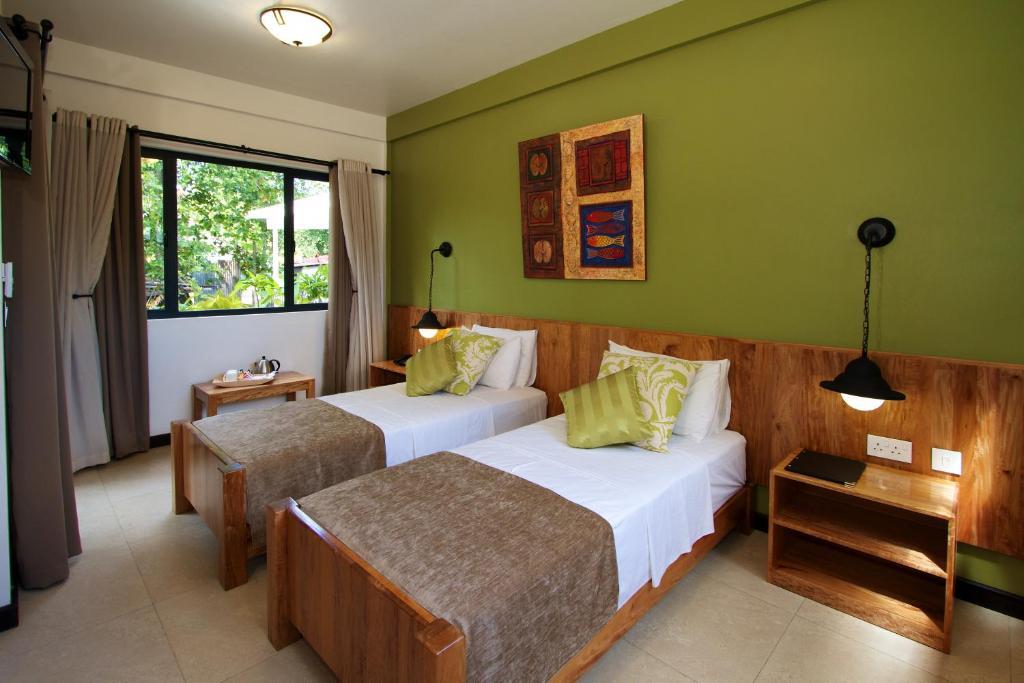 Le Repaire - Boutique Hotel & Restaurant La Digue Værelse billede